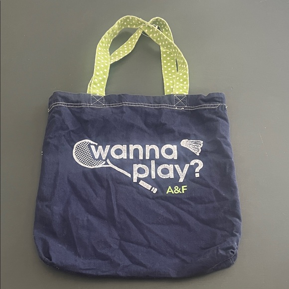 Abercrombie & Fitch Navy Tote with Green Polka Dot Handles “wanna play?” - Picture 1 of 2